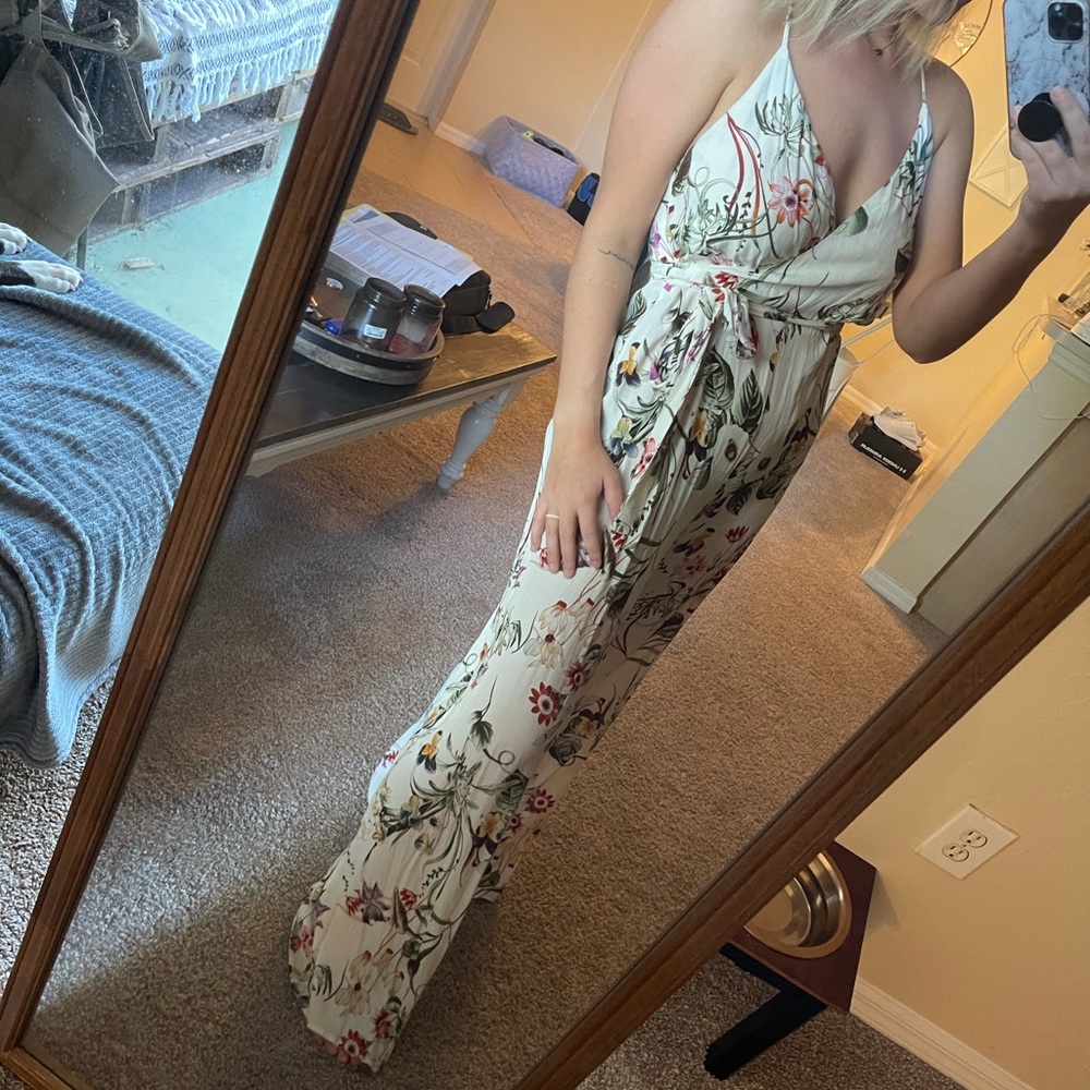 Creamy white floral spaghetti strap jumpsuit